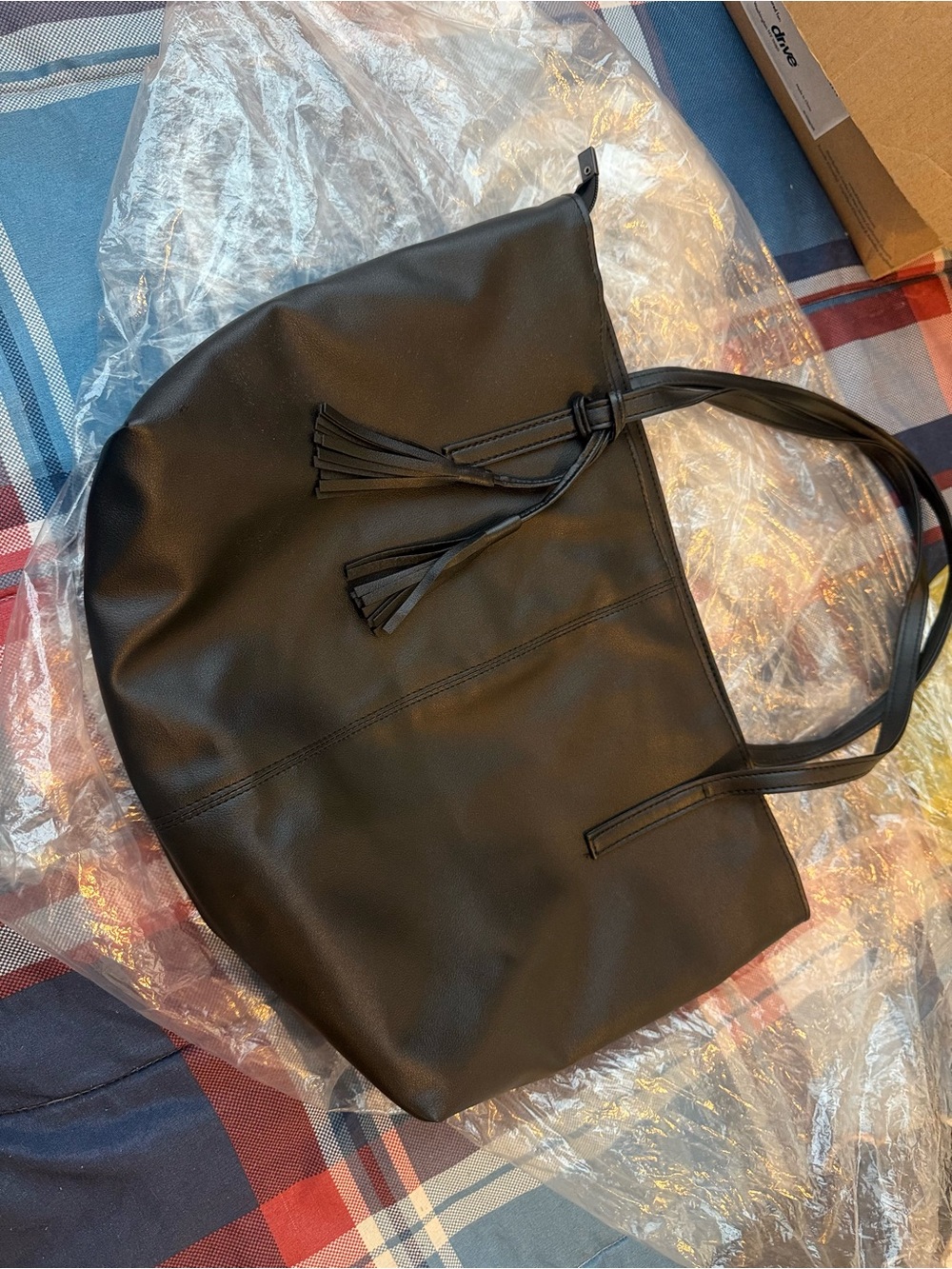 Classic Black Tote Bag with Tassel Accent